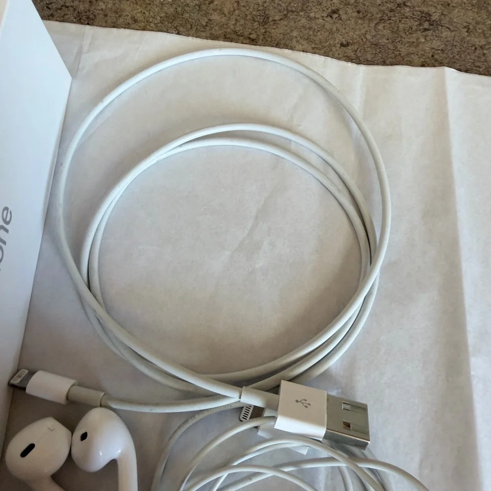 Apple iPhone with White Earphones